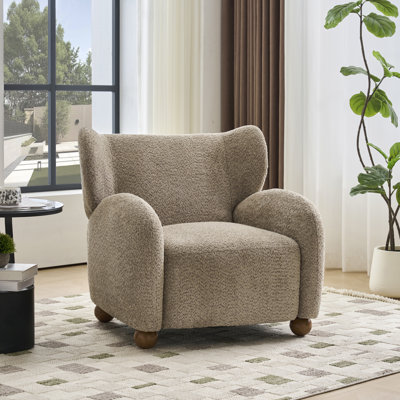 Caden Mid-Century Modern Bouclé Wingback Club Chair with Rounded Legs