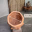 Faces terracotta planter