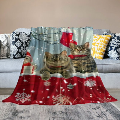 Couverture en laine à motif chat de Noël, flocons de neige, sherpa, idéale pour le lit, le canapé ou le lit. Imprimé chaton mignon, peluche douce et chaude, rouge et blanche, pour la décoration de la chambre (127 x 152 cm). De plus, un sac fourre-tout en toile à motif chat et chapeau de Noël vous est offert.