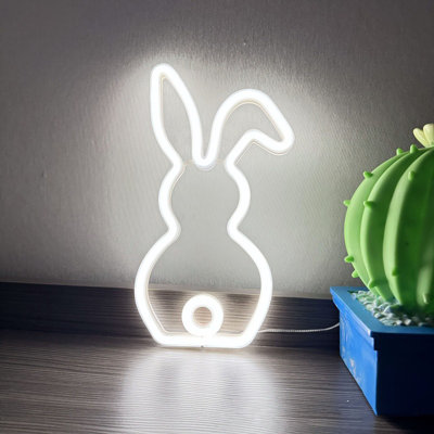 Mignonne lapine à queue de néon pour Pâques