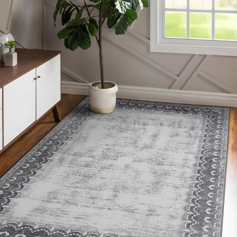 Gray Bordered 5' x 7' Washable Synthetic Rug