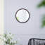 Miroir mural circulaire avec cadre en bois-655637365