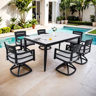 Ensemble repas 7 pièces avec chaises pivotantes et coussins Sunbrella Cioffred