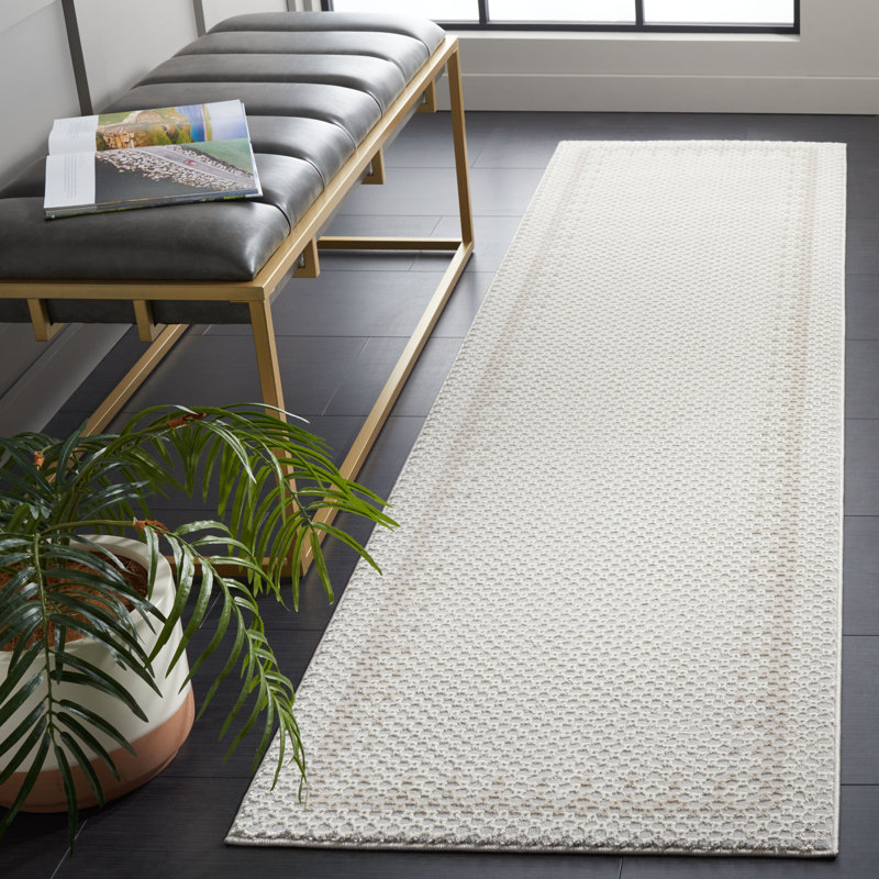 Tapis géométrique en polyester / polypropylène tissé à la machine en gris clair / gris foncé