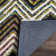 Airiona Hand Tufted Wool/Cotton Chevron Rug in Black/White