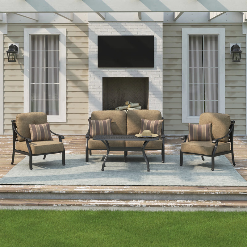 Frazee 4-Piece Patio Loveseat Conversation Set with Cushions and 21 x 42'' Rectangular Coffee Table