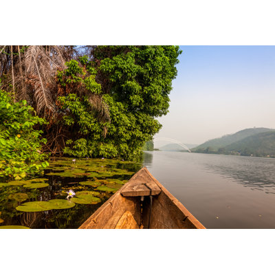 Canoe Ride In Africa by Jacek_Sopotnicki - Wrapped Canvas Print