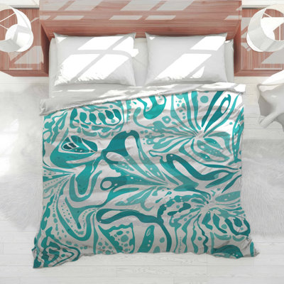 Édredon floral abstrait turquoise