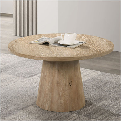 Table basse ronde de style contemporain avec structure en bois d'hévéa et piédestal en forme de cône, finition chêne