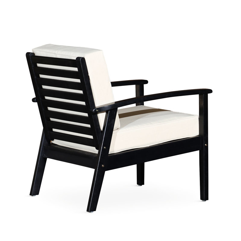 Fauteuil en eucalyptus avec assise profonde et coussins bistro foncés pour une tranquillité extérieure
