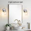 Applique murale moderne pour salle de bain avec abat-jour en verre transparent, finition chromée, base E26, idéale pour le meuble-lavabo, le miroir et le couloir