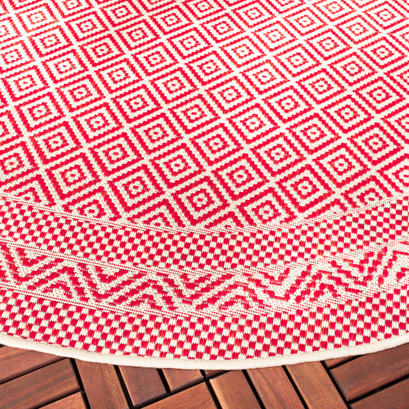 Tapis intérieur / extérieur beige / rouge à motif géométrique Arneshia, Rond 6 pi 7 po