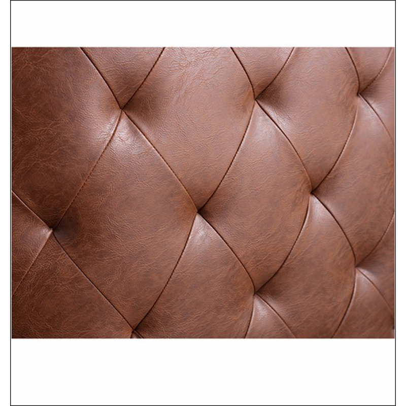 Fauteuil demi-tonneau capitonné Capstone