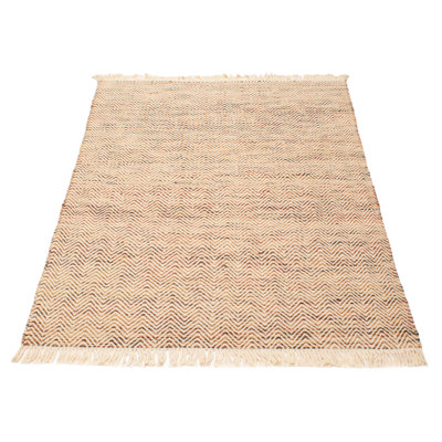 Plush comfort with an artisan-crafted look and texture. Soft, lustrous yarns are hand woven to create an array of textures, including oversized loops and flat surfaces that are rich in dimension.