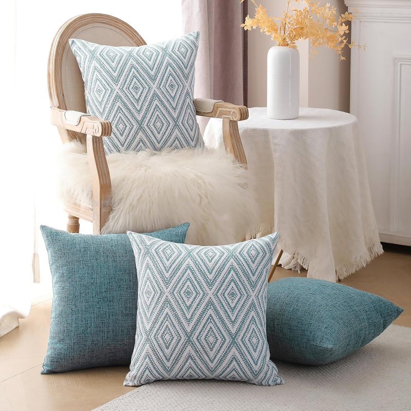 Housse de coussin, taille 18 x 18 cm, chaque ensemble comprend 4 taies d'oreiller, faites de matériau texturé bleu.