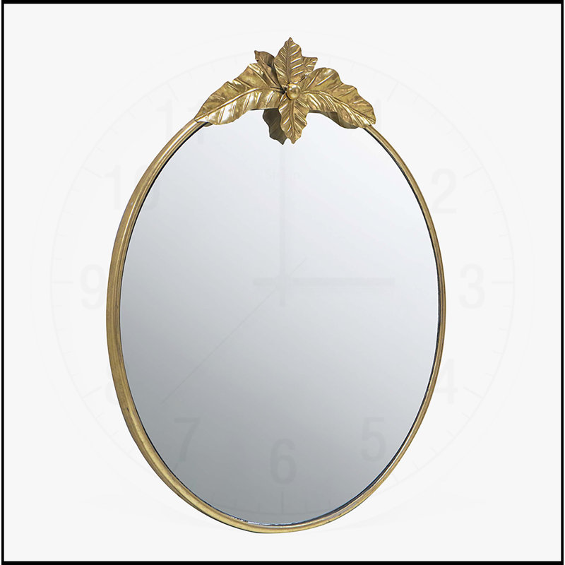 Grand miroir mural rond avec cadre en métal doré et ornement inspiré de la nature