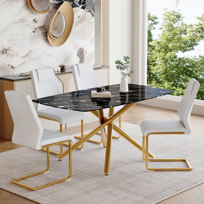 Ensemble de table de salle à manger luxueux en verre trempé à motif de marbre noir avec pieds en métal doré et 4 chaises en polyuréthane blanc