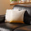 Causeuse-coussin modulable noire en cuir véritable