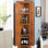 Unité de coin de 72 po de hauteur avec 8 portes - Solution de rangement polyvalente couleur chêne pour le bureau à domicile Grand garde-manger pour maximiser l'espace