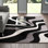Tapis noir Alyta