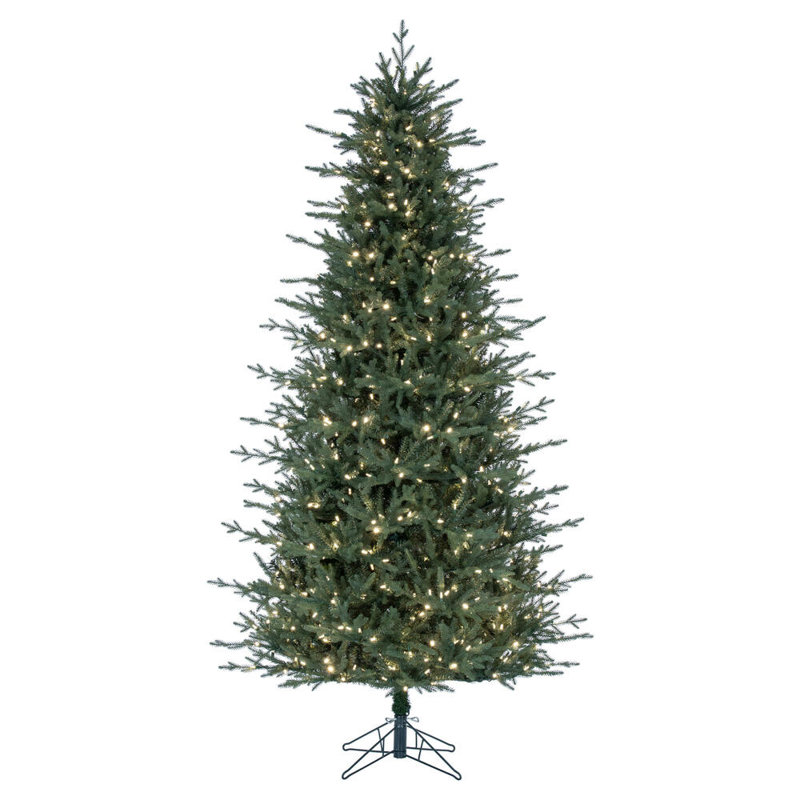 Vickerman 9.5' x 60" Slim Itasca Fraser Fir Artificial Pre-Lit Christmas Tree with 1050 Warm White LED Mini Lights, 3076 Realistic PE/PVC Tips, 6' Step On/Off Power Cord and Folding Metal Tree Stand. Assembly is required.