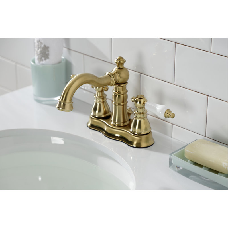 Kingston Brass American Patriot Two-Handle 3-Hole Deck Mount 4" Centerset Bathroom Faucet with Pop-Up Drain