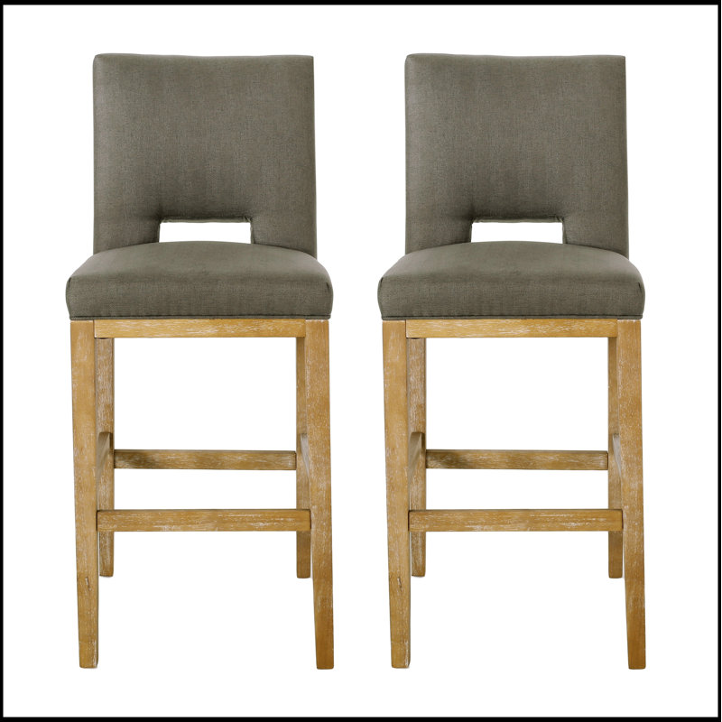 Tabouret de bar moderne rembourré avec base en bois robuste, conçu pour le confort et le style dans les espaces de salle à manger contemporains.