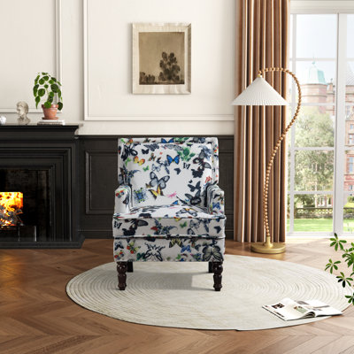 Chaise d'appoint rembourrée avec structure en bois massif et pieds tournés