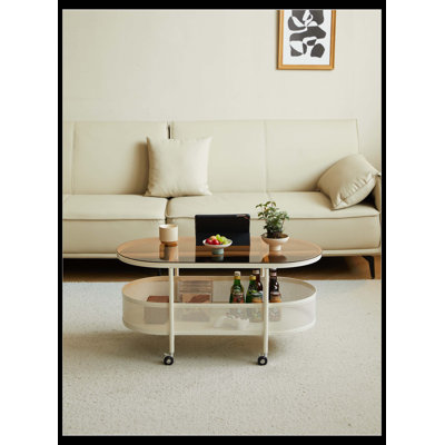 Table basse mobile ovale en métal avec rangement