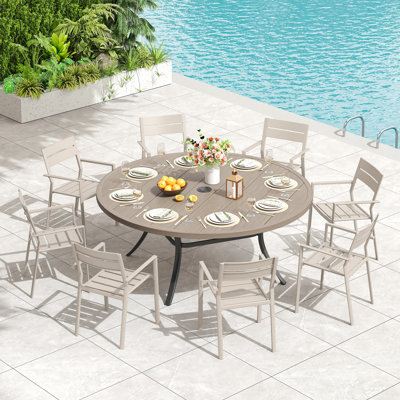 Ensemble repas de 60 po avec table ronde en métal et 8 chaises avec accoudoirs en métal