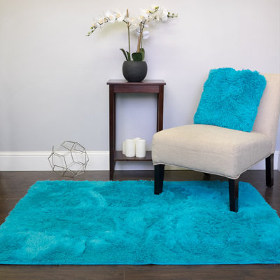 Tapis rectangulaire en fausse fourrure à poils longs Hutton 4 pi x 5 pi - Turquoise