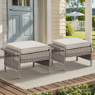 Ensemble de 2 repose-pieds d'extérieur en osier PE, coussins de patio en rotin gris avec coussins beiges pour cour ou terrasse