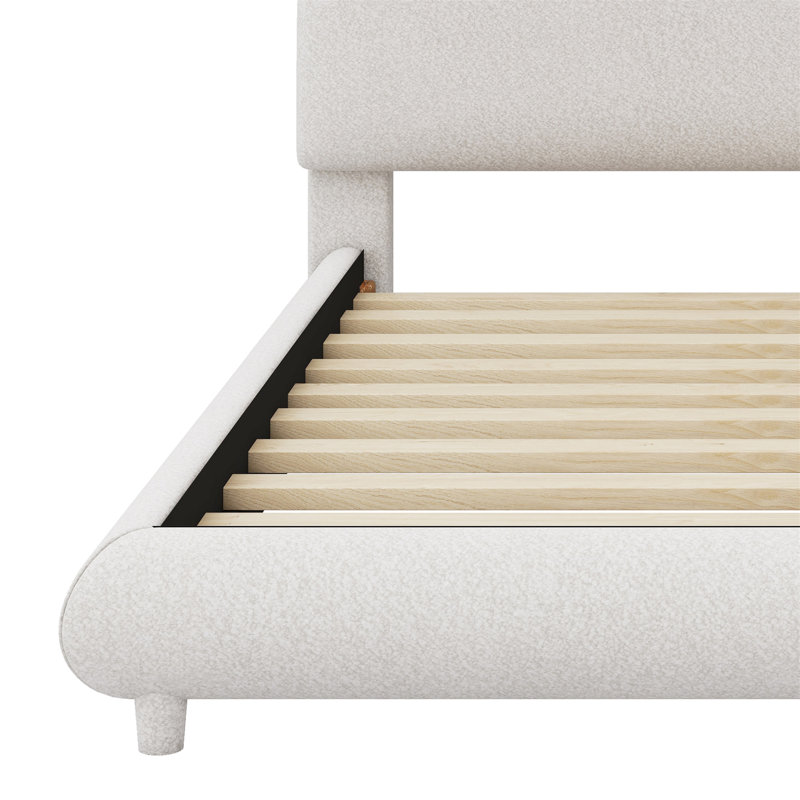 Lit plateforme tapissier avec tissu épais, structure solide et design courbé élégant