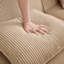 Canapé modulaire moderne en L à 4 places avec sièges profonds, coussins décoratifs et repose-pieds mobile pour un confort et une polyvalence ultimes