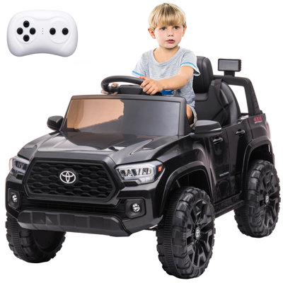Officially Licensed Toyota Tacoma 12V Kids Ride-On Car with Remote Control – Spring Suspension, Safety Belt, Gentle Start, LED Headlights, 2 Speeds – Electric Vehicle for Ages 3-8