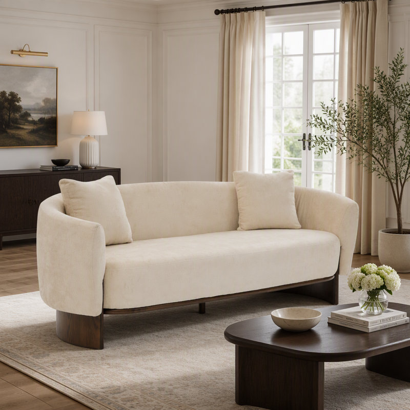 Canapé incurvé en tissu bouclé avec base en bois massif pour un confort optimal dans un salon moderne et une décoration intérieure élégante