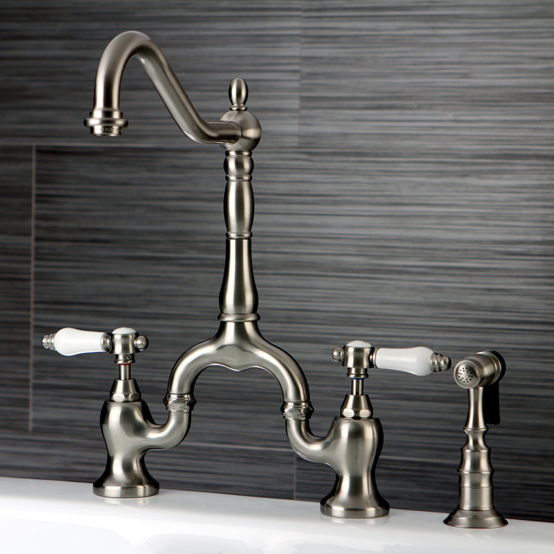 Kingston Brass Heirloom Two-Handle 3-Hole Deck Mount Bridge Kitchen Faucet with Brass Side Sprayer, Lever Handle