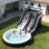 Relancez le bain d'eau gonflable de qualité commerciale de 25 pi pour les enfants adultes, glissières d'eau d'adulte de PVC résistantes avec la grande piscine hermétique, glissade d'eau noire et blanche avec le ventilateur 1100W pour l'extérieur
