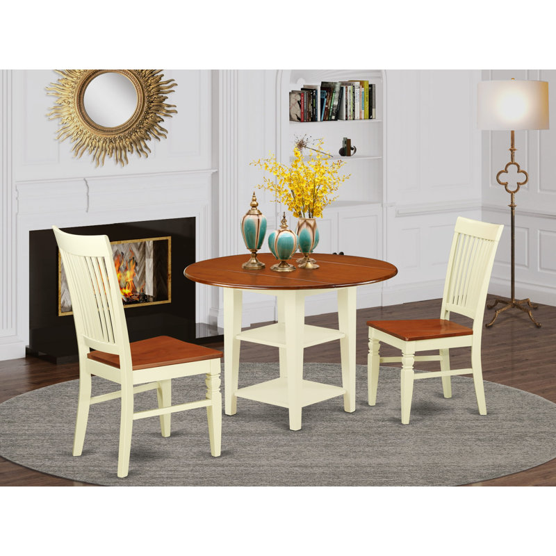 L'ensemble 3 pièces de table et chaises de cuisine comprend une table de salle à manger ronde avec Dropleaf et des tablettes et 2 chaises de salle à manger, babeurre et cerise