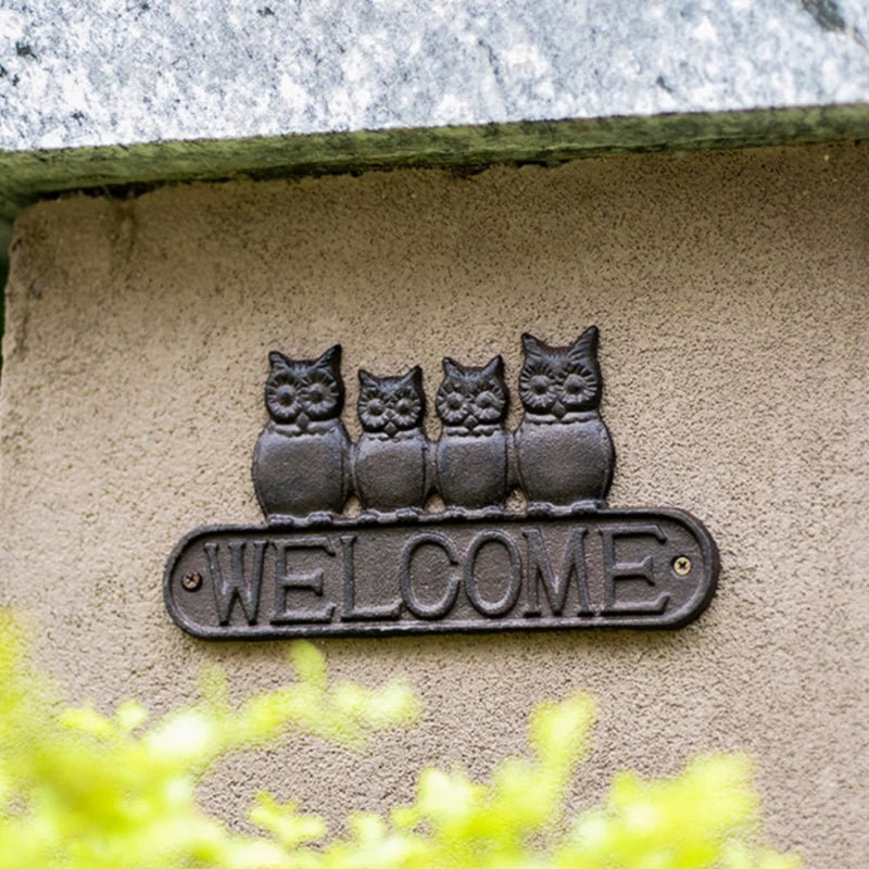 Four Owls Cast Iron Welcome Sign