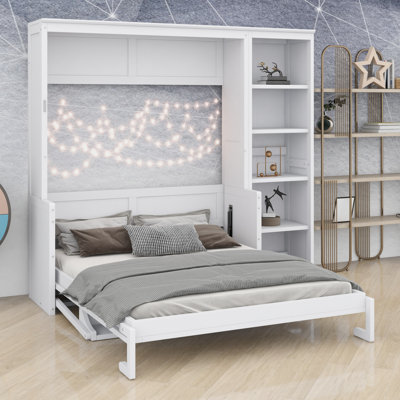 Lit escamotable avec bureau intégré et bibliothèque intégrée