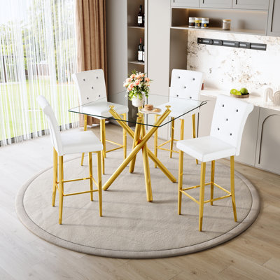 Table de bar en verre et tabourets à hauteur fixe, hauteur de comptoir contemporaine avec base dorée, chaises en cuir Pu blanc pour la maison dans les petits espaces, structure, sièges ergonomiques, conception de pub simple à deux pieds