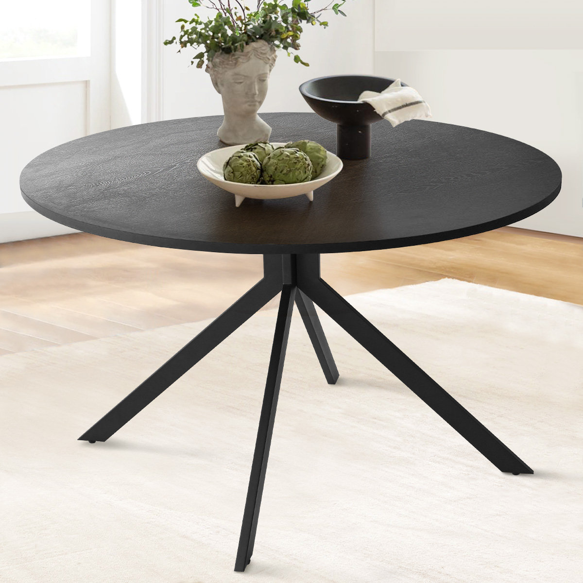 Large black round dining table hotsell
