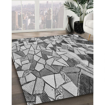 Tapis gris tissé à la machine