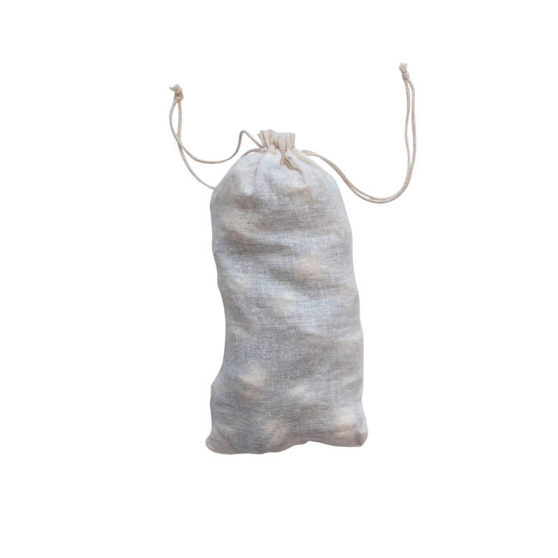 Ornements en verre mercurisé gaufré dans un sac en mousseline antique