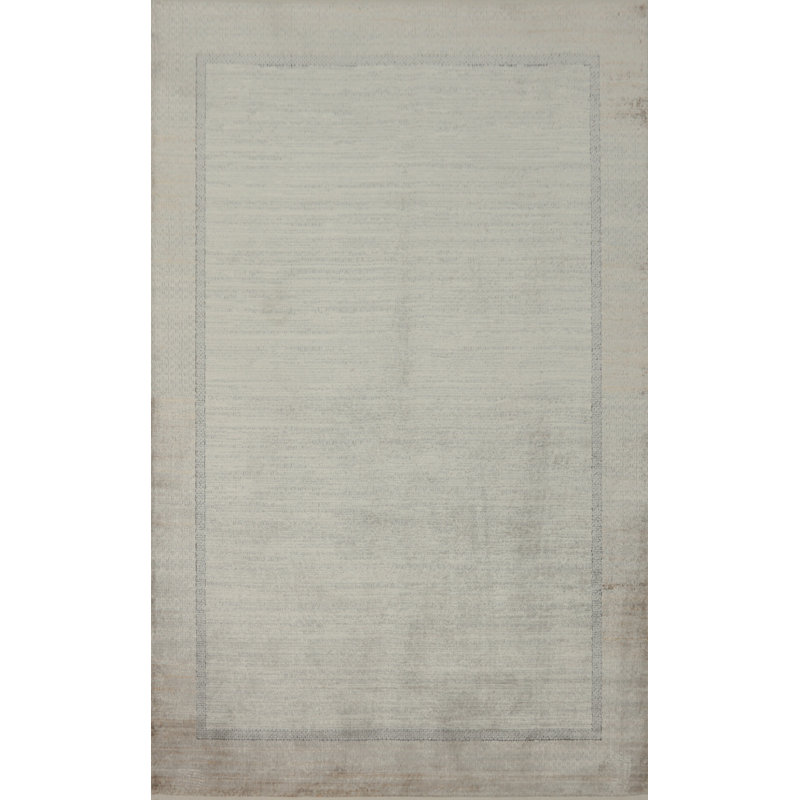 Élégant tapis minimaliste avec des motifs de bordure subtils 5 x 7