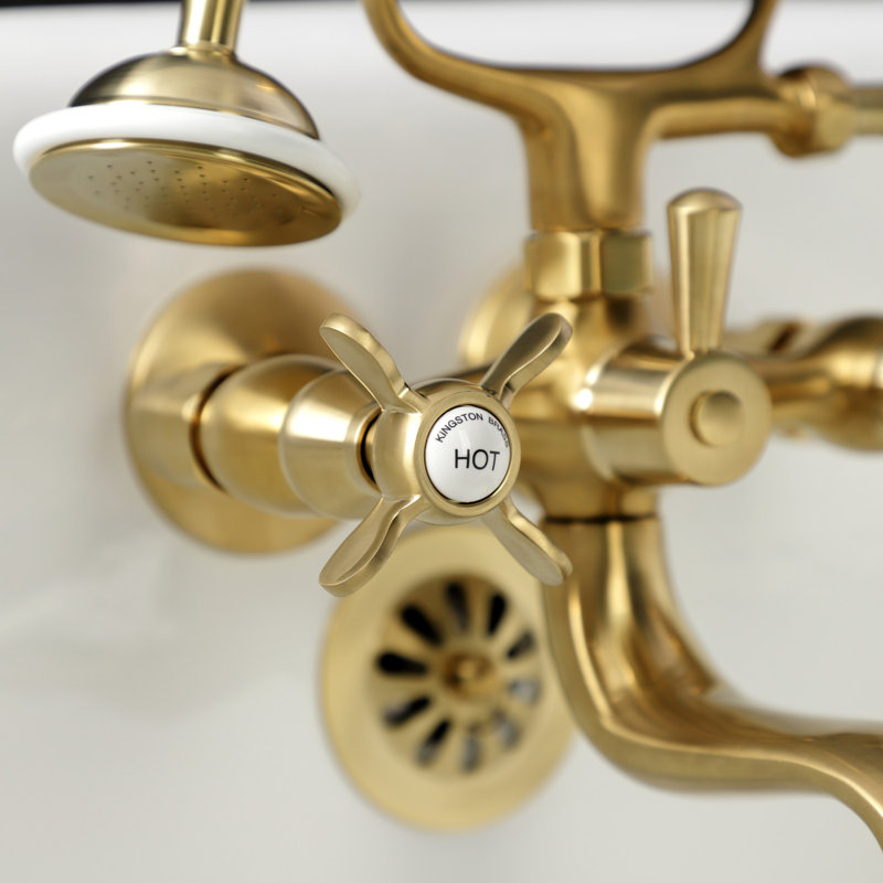 Kingston Brass Essex Three-Handle 2-Hole Tub Wall Mount Clawfoot Tub Faucet with Handshower, Brushed Brass