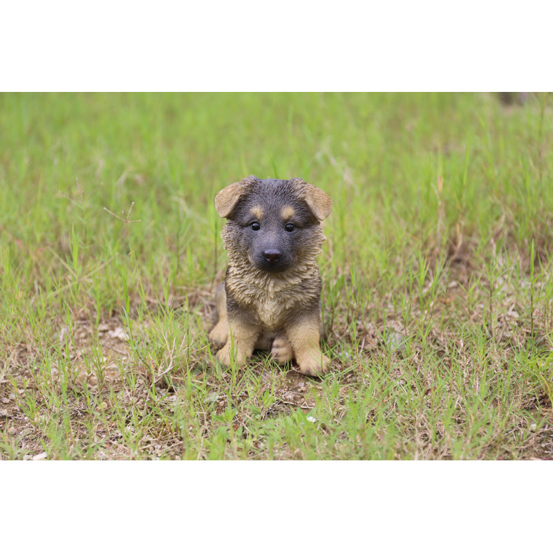 Statue de chiot berger allemand assis