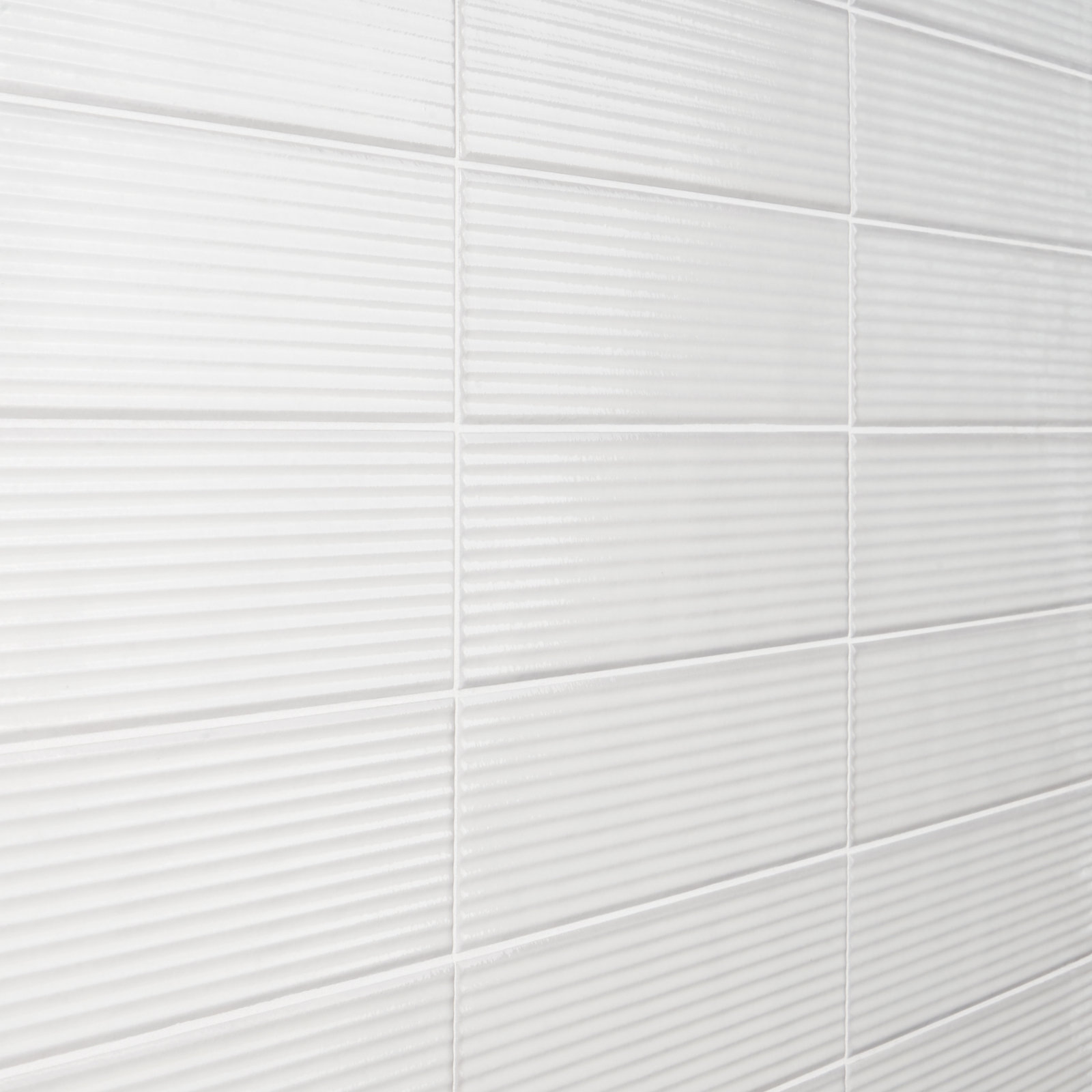 Stacy Garcia Olimar Grooved 4" x 16" Polished Porcelain Subway Wall Tile (7.74 Sq. Ft. / Case), Bianco