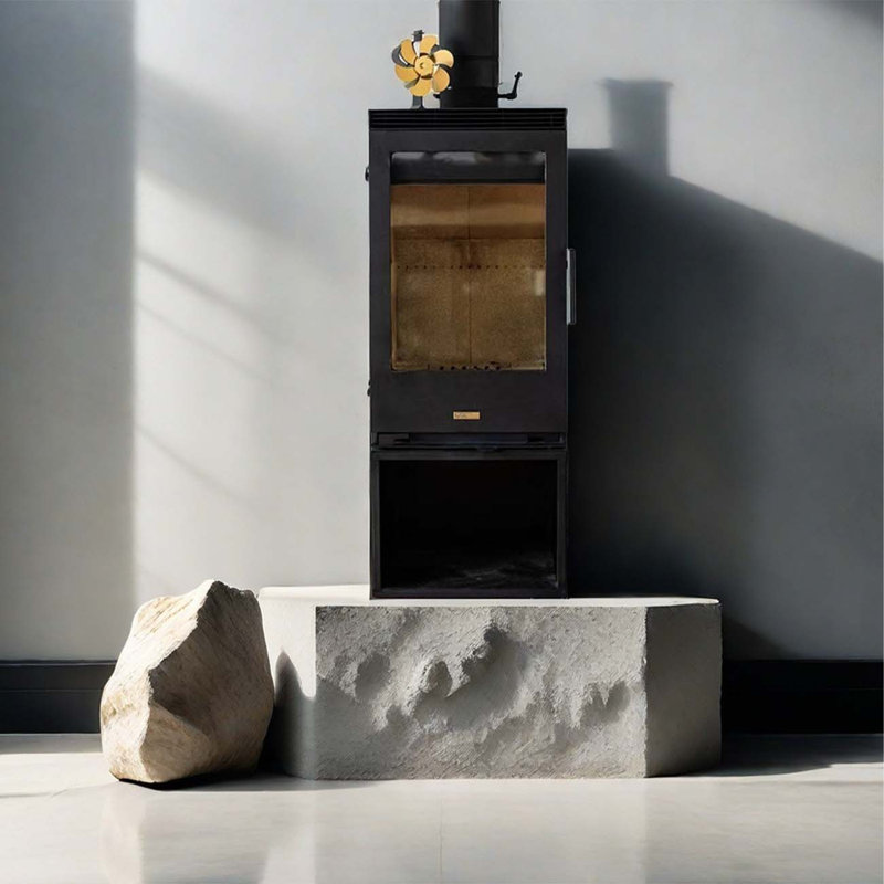 A steel hearth burns wood to warm the fireplace
